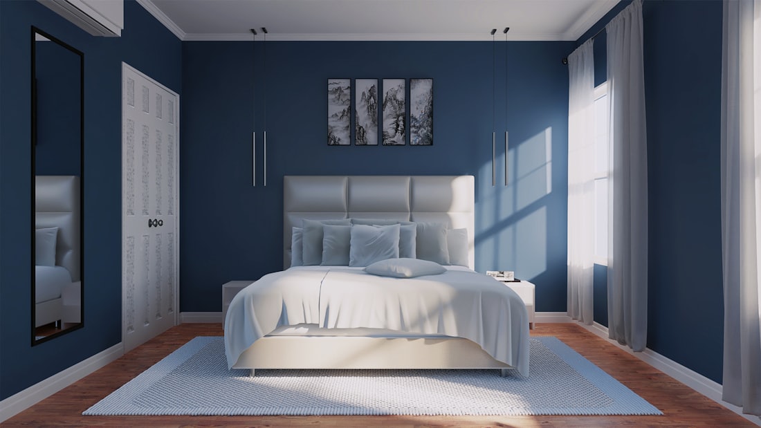 Bedroom with soft blue walls